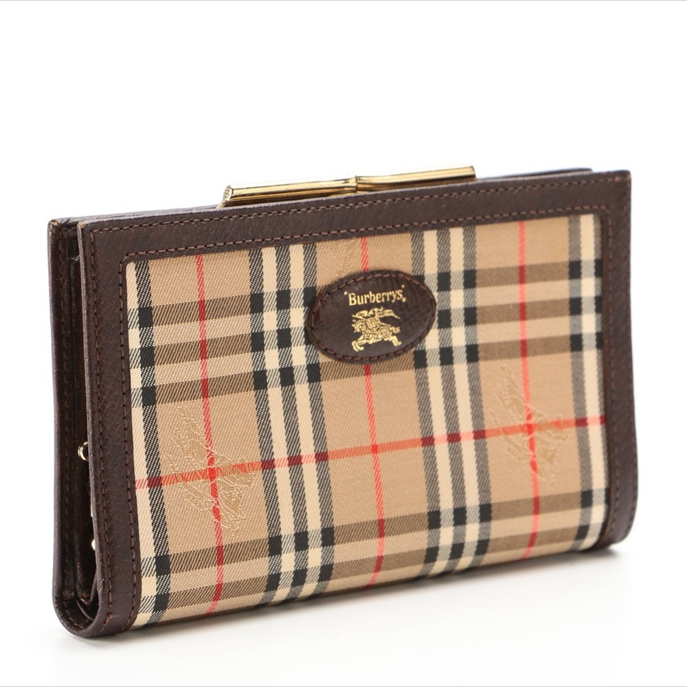 Vintage Burberrys hay market check canvas and leather kiss lock clutch.